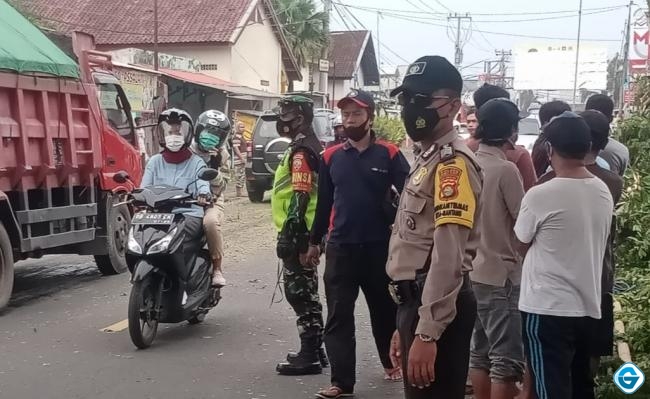 Tekan Angka Penularan Covid-19, TNI-Polri Gencar Lakukan Razia Masker